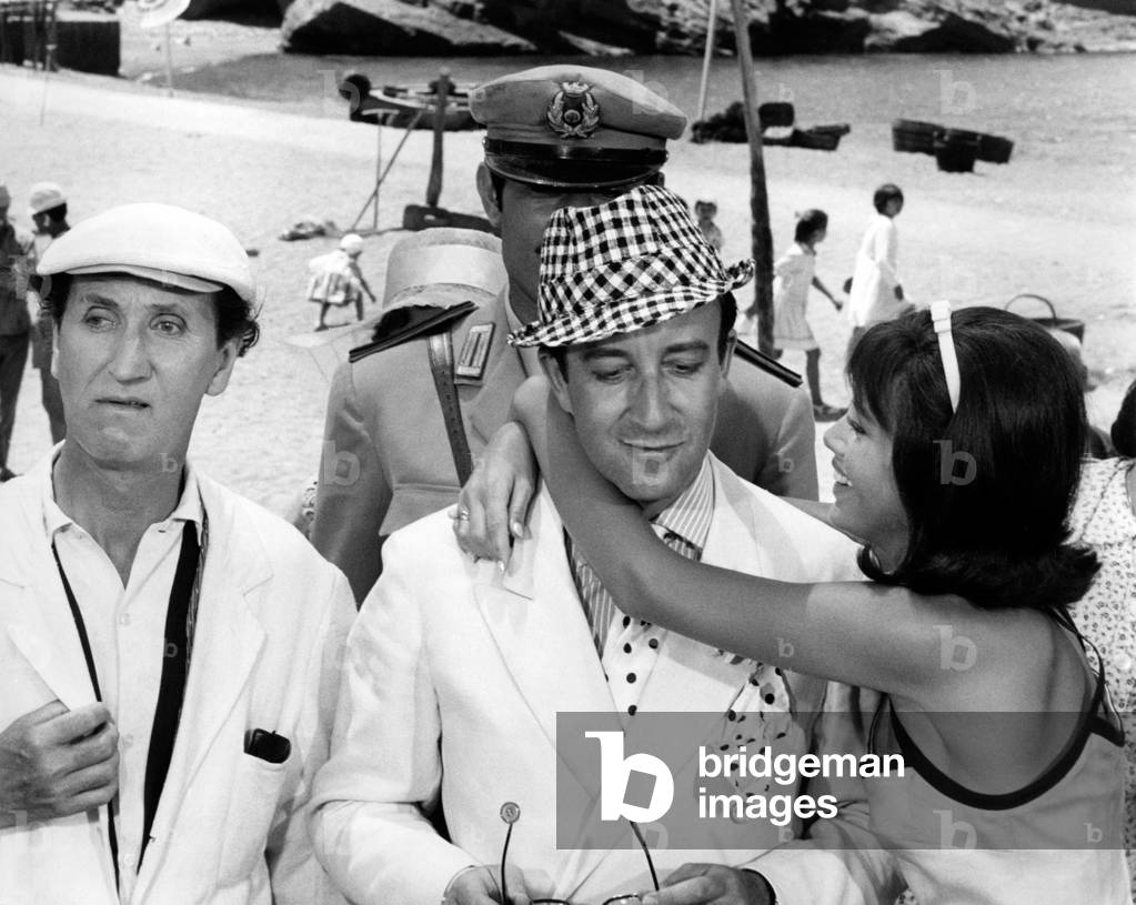 Peter Sellers, Mac Ronay and Britt-Marie Ekland in 'After the fox', 1966 (b/w photo)