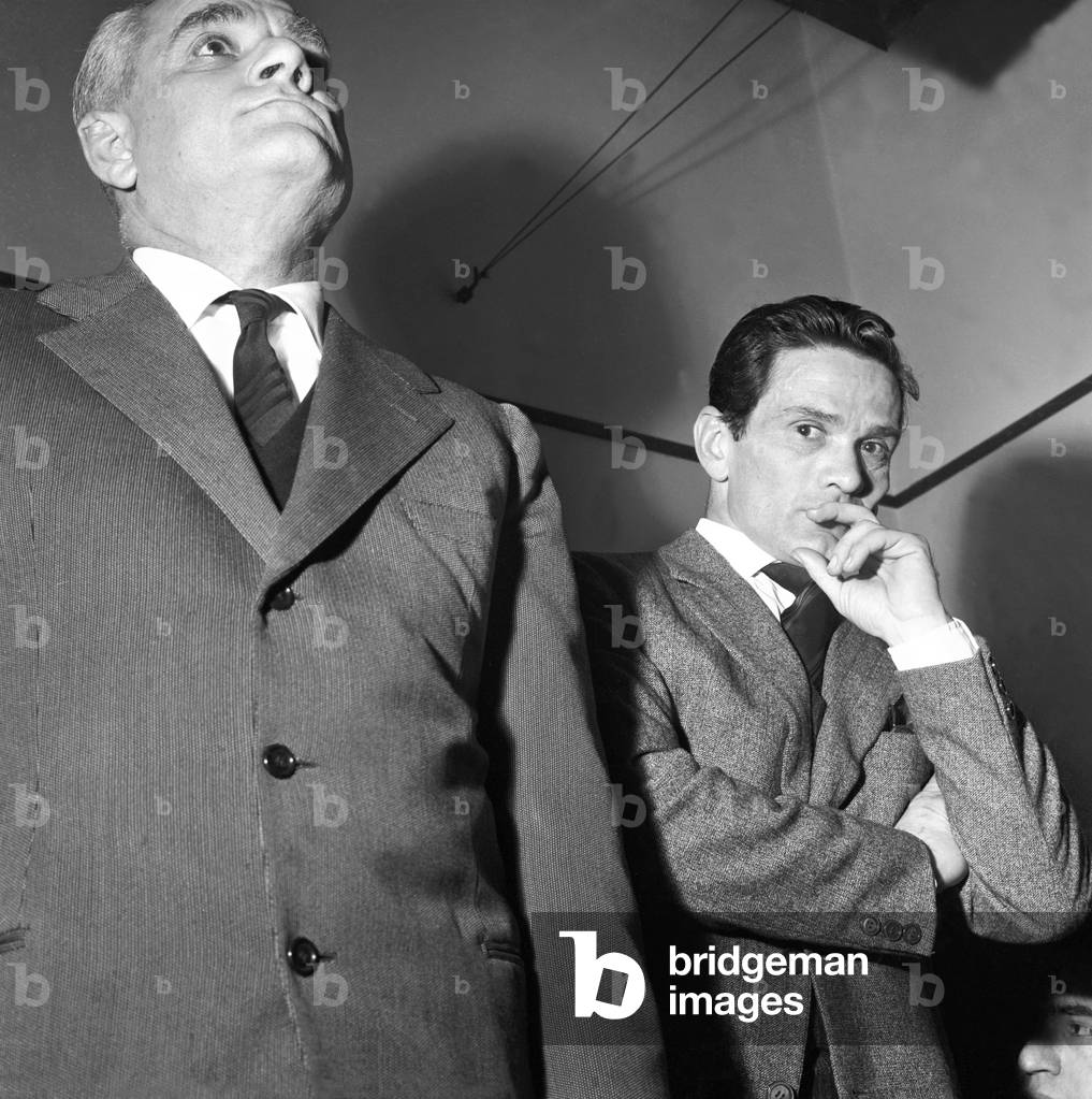 Alberto Moravia and Pier Paolo Pasolini attending a cocktail party, Italy, 1965 (b/w photo)