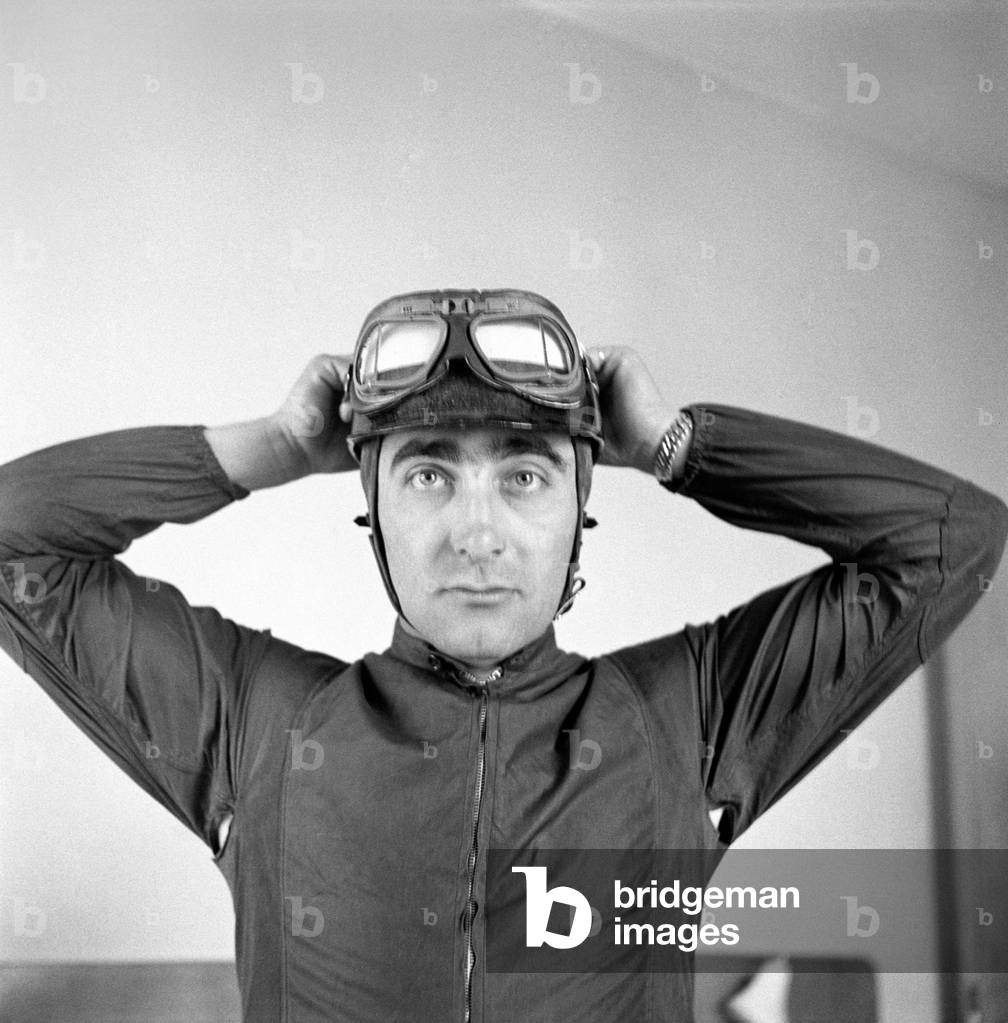 Eugenio Castellotti wearing his racing goggles, Brescia, Italy