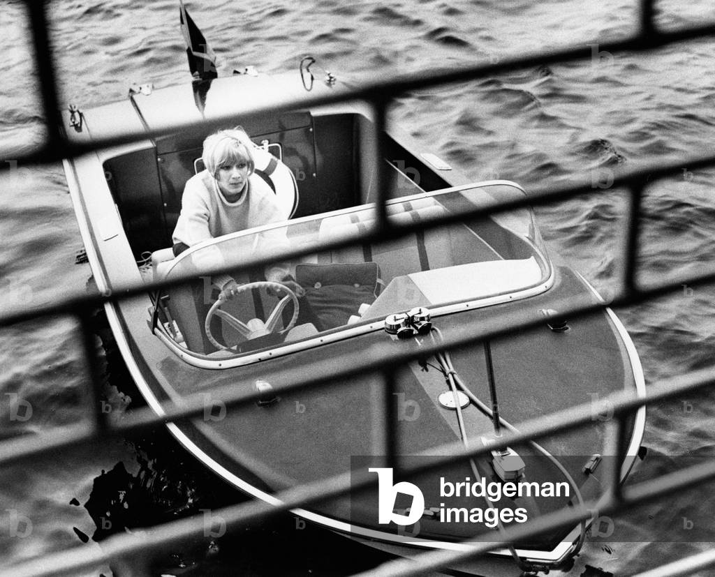 Portrait of Gisella Pagano driving a motorboat
