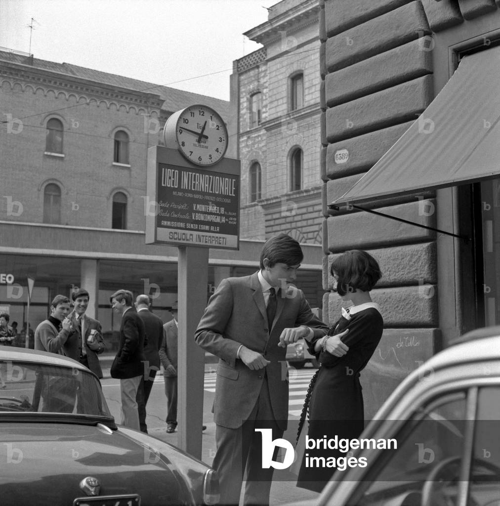 A young couple arguing in the street, Italy
