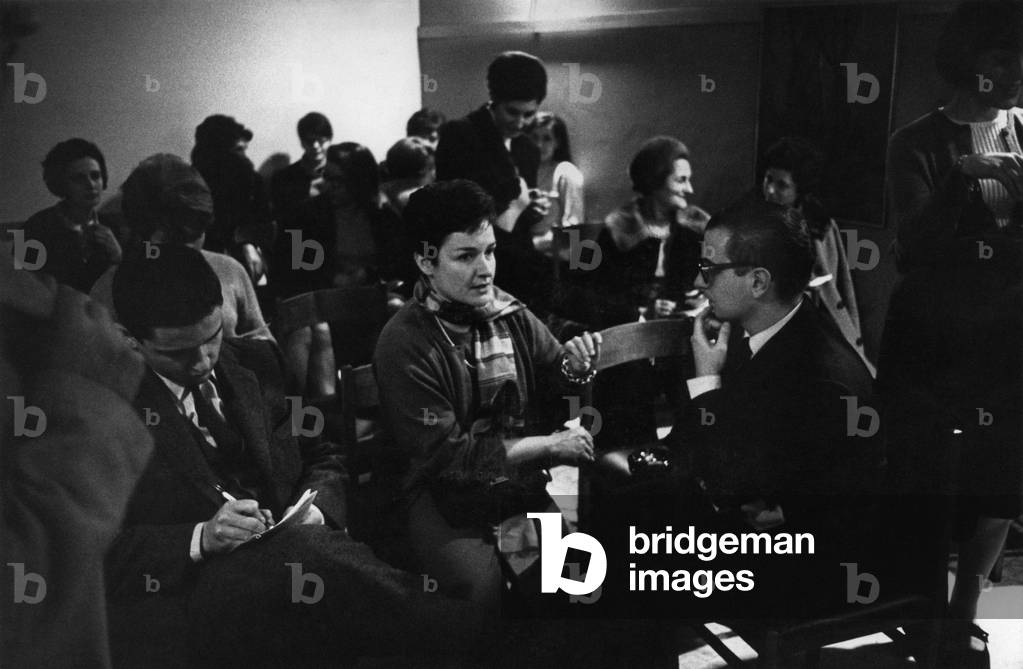 Young people talking,  Milan, Italy