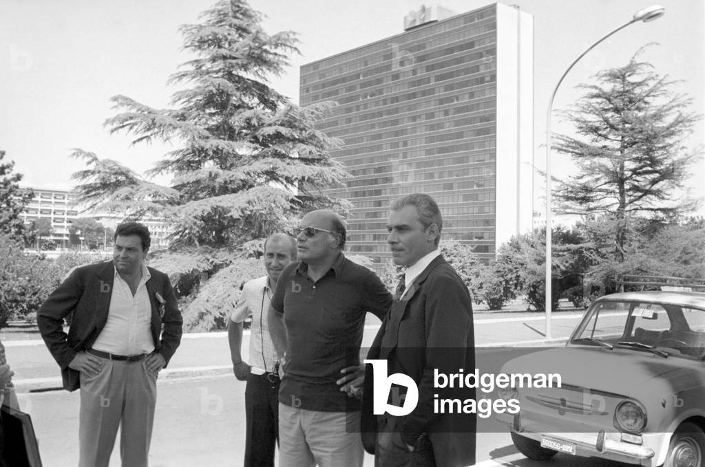 Gian Maria Volonté and Francesco Rosi on the film set of The Mattei Affair (b/w photo)