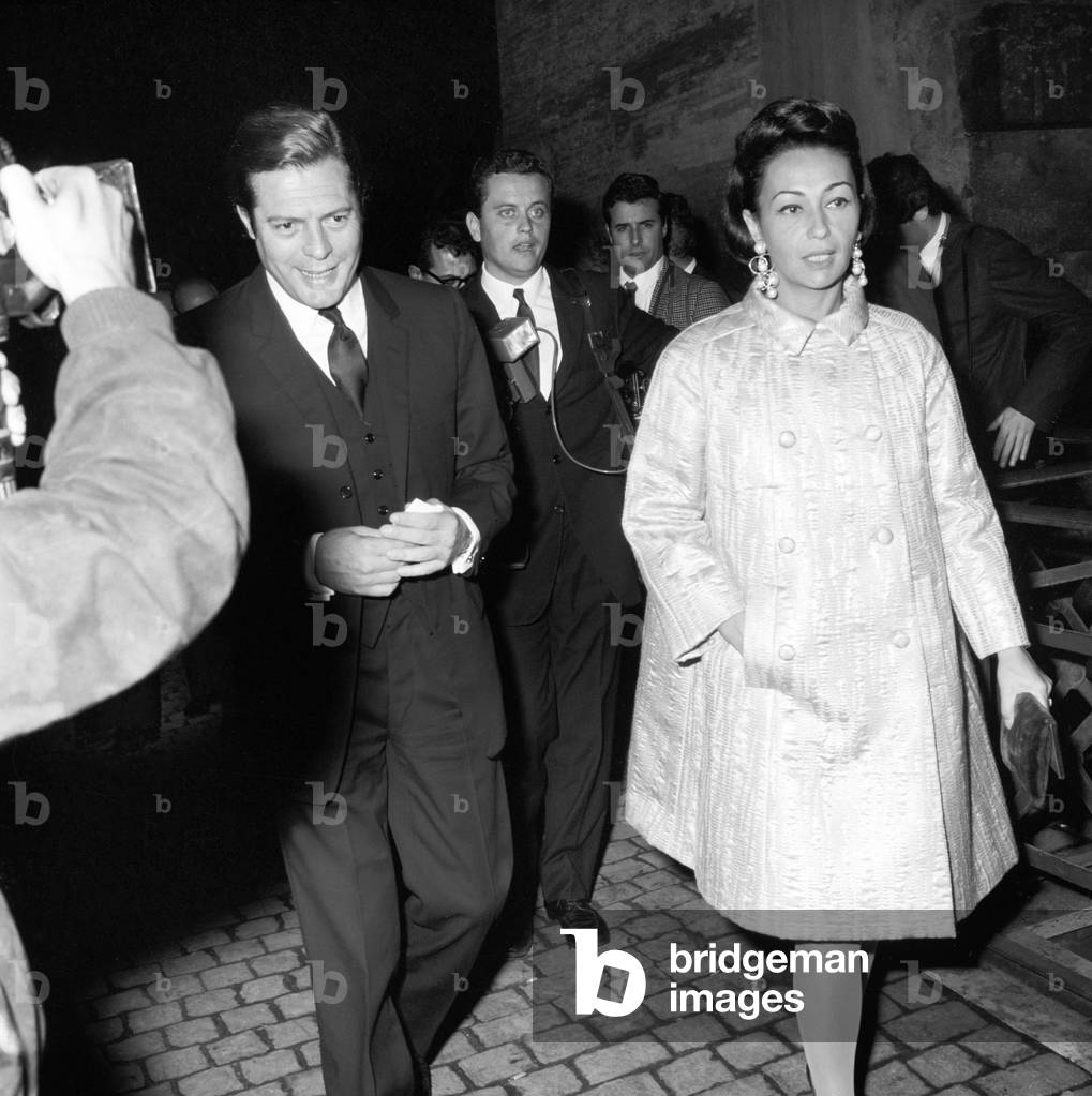 Marcello Mastroianni and Flora Carabella attending an awarding ceremony, Italy, 1972 (b/w photo)