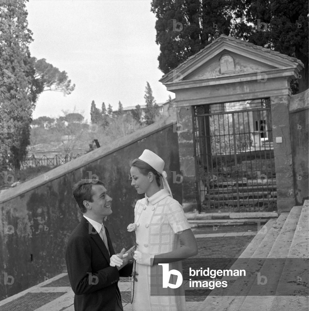 A young married couple smiling in the day of their wedding, Italy