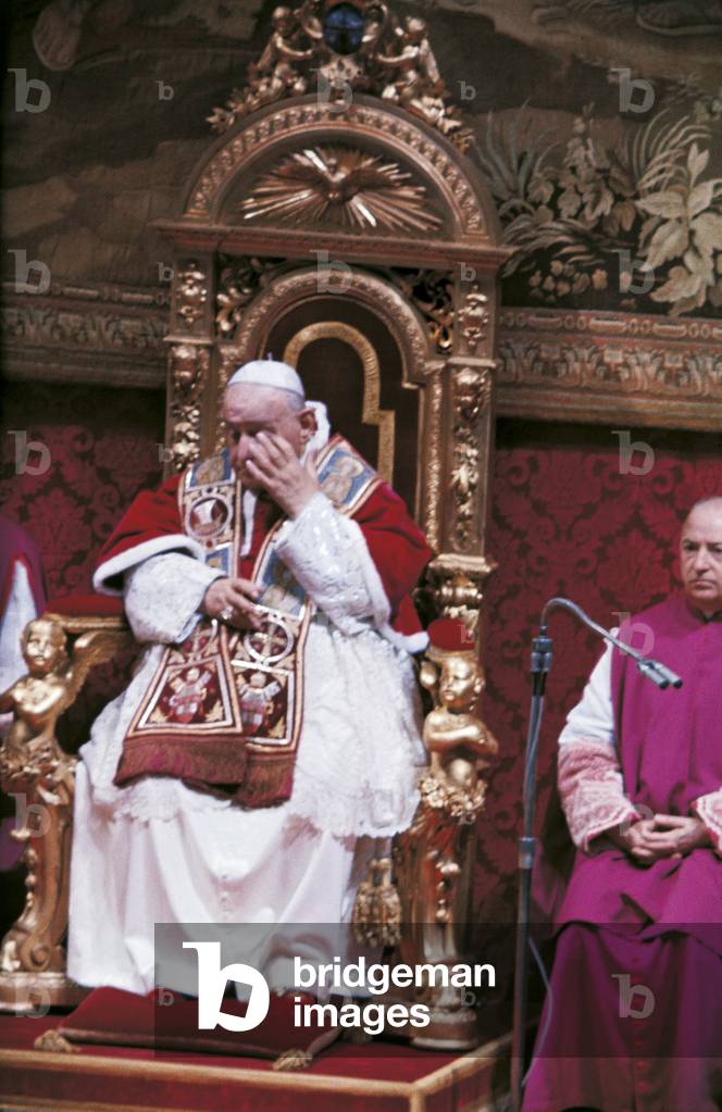 Pope John XXIII sitting on the papal throne