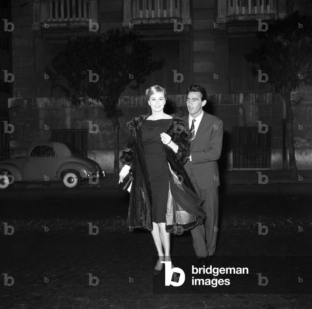 Walter Chiari and Anita Ekberg leaving the 'Piccolo Budapest' night club, Italy, 1950 (b/w photo)