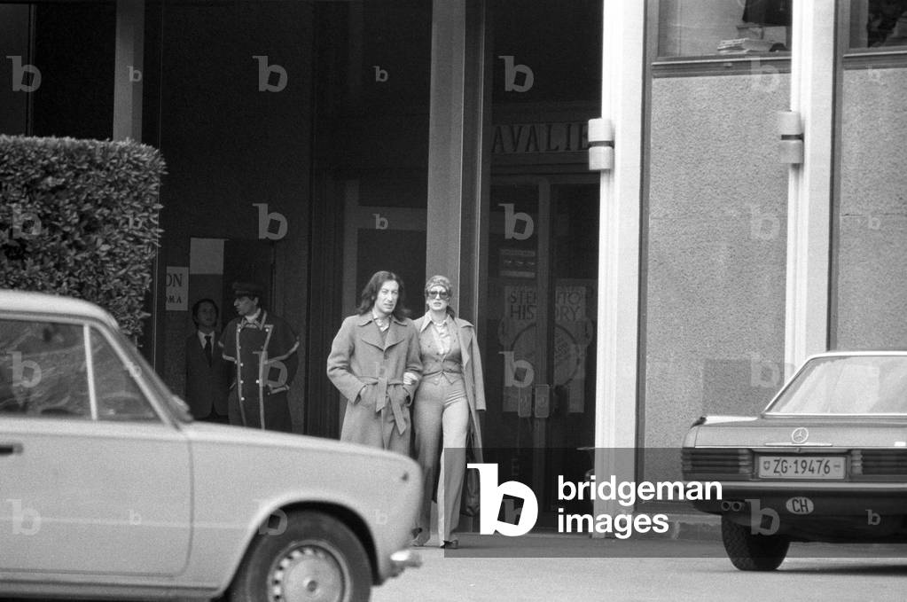Mina holding arms with Alfredo Cerruti, Italy, 1974 (b/w photo)