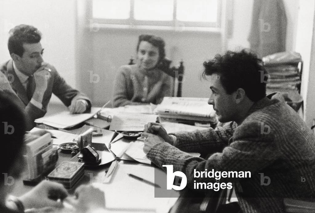 Enrico Berlinguer talking to some politicians, 1950 (b/w photo)