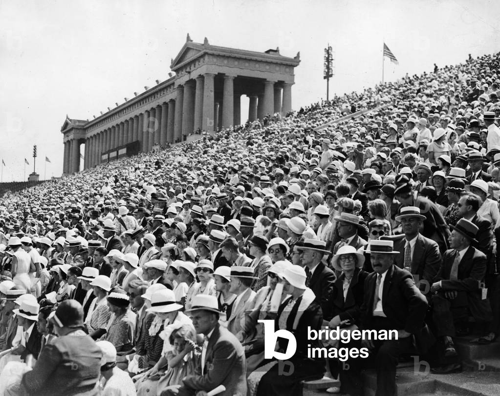 Crowd sitting on the terraces of a stadium