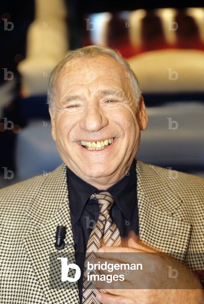 Mel Brooks smiling to the photographer
