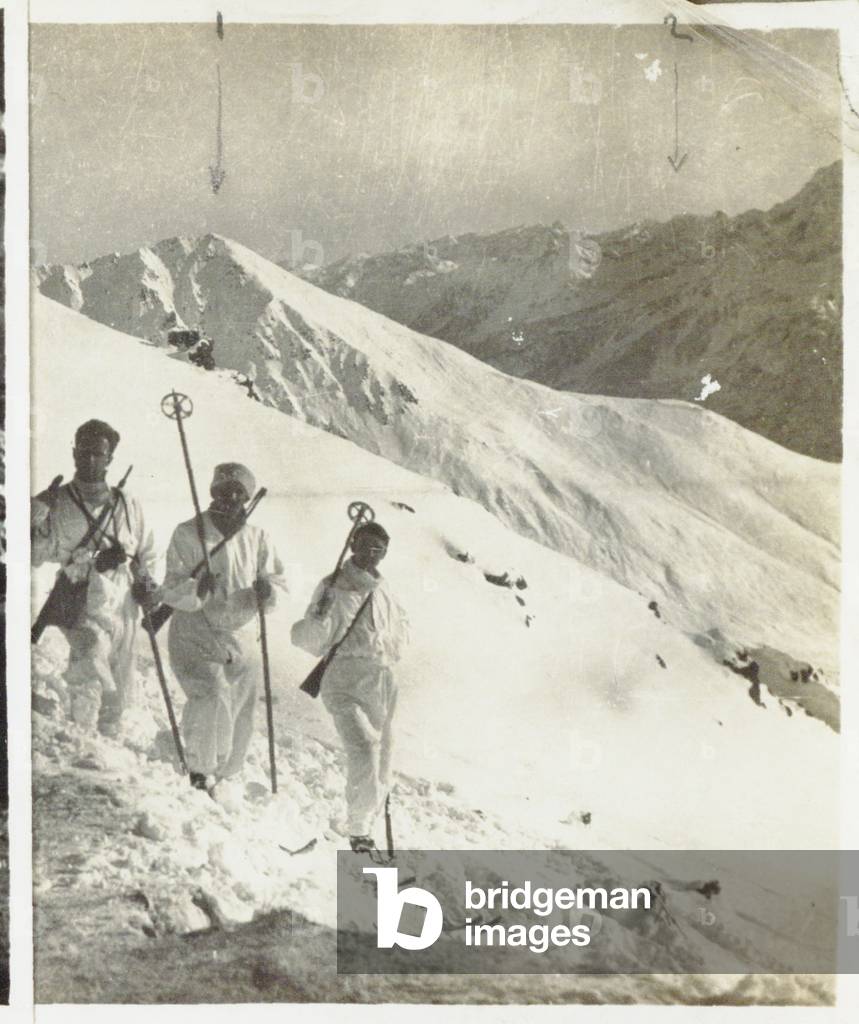 Skiers on Albiolo Valley; In the background Austrian Tonale , Italy
