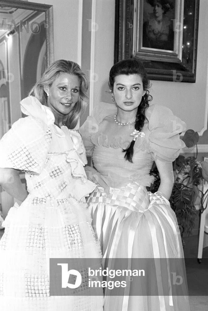 Marisa Allasio and Anda Federica Angelica Maria dei Conti Calvi di Bregolo in Elvira Gramano's atelier, Italy, 1980 (b/w photo)