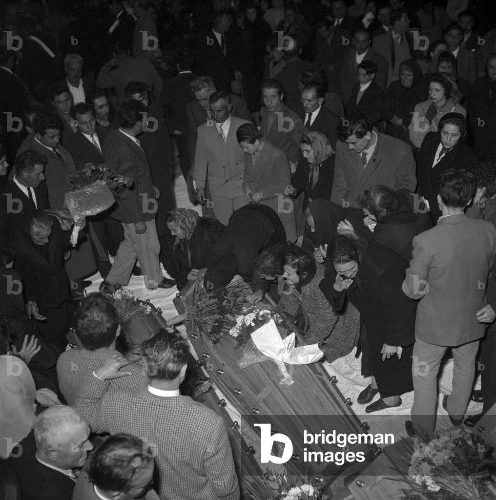 People crying at the funeral of the victims of Marcinelle, Manoppello, Italy
