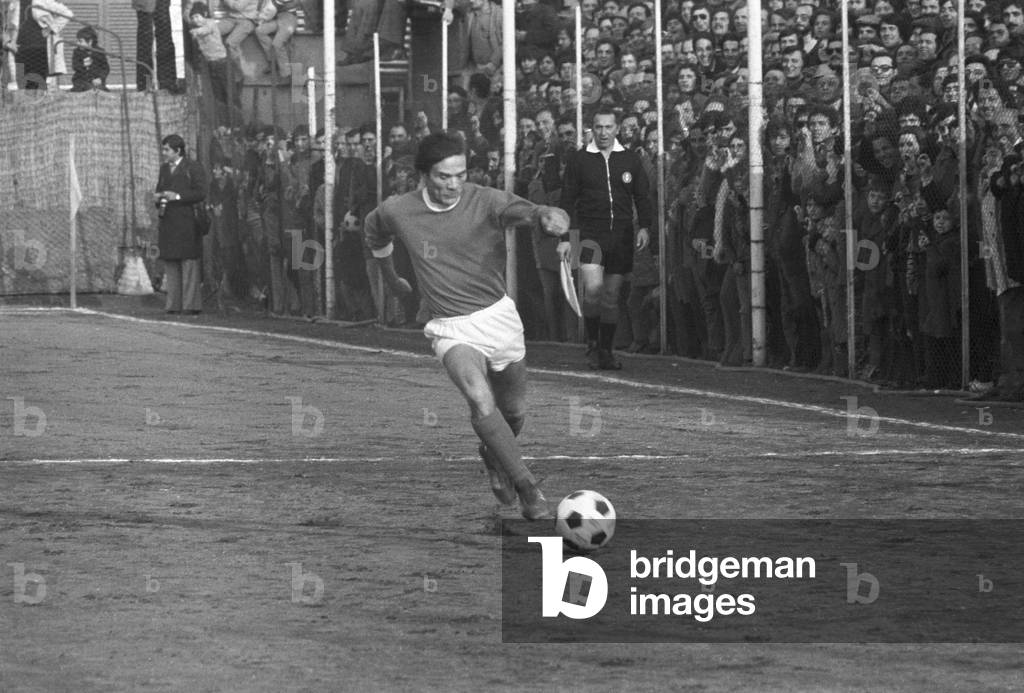 Pier Paolo Pasolini playing football, Italy, 1974 (b/w photo)