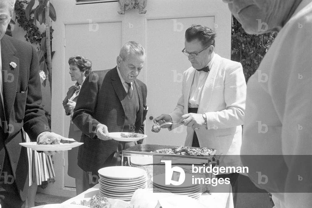 William Wyler having breakfast in Hollywood (b/w photo)