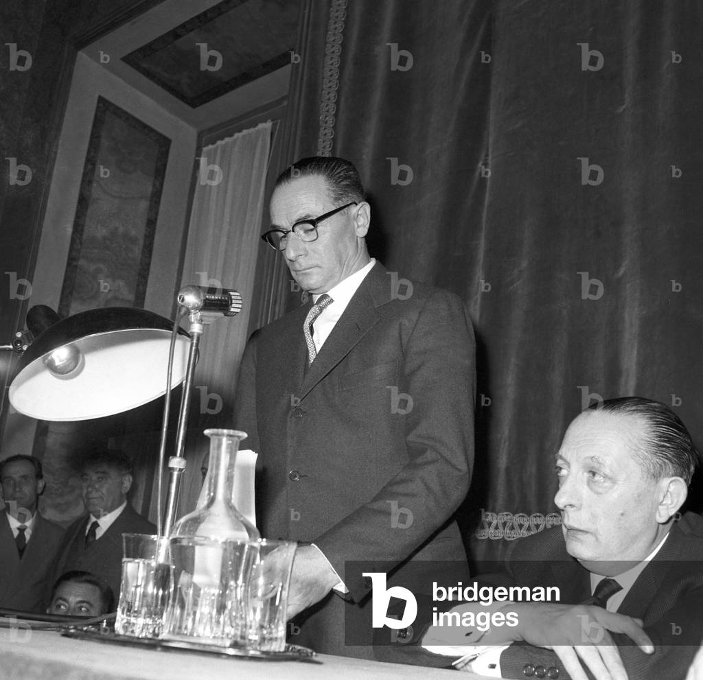 Enrico Mattei speaking in a meeting, Italy, 1959 (b/w photo)