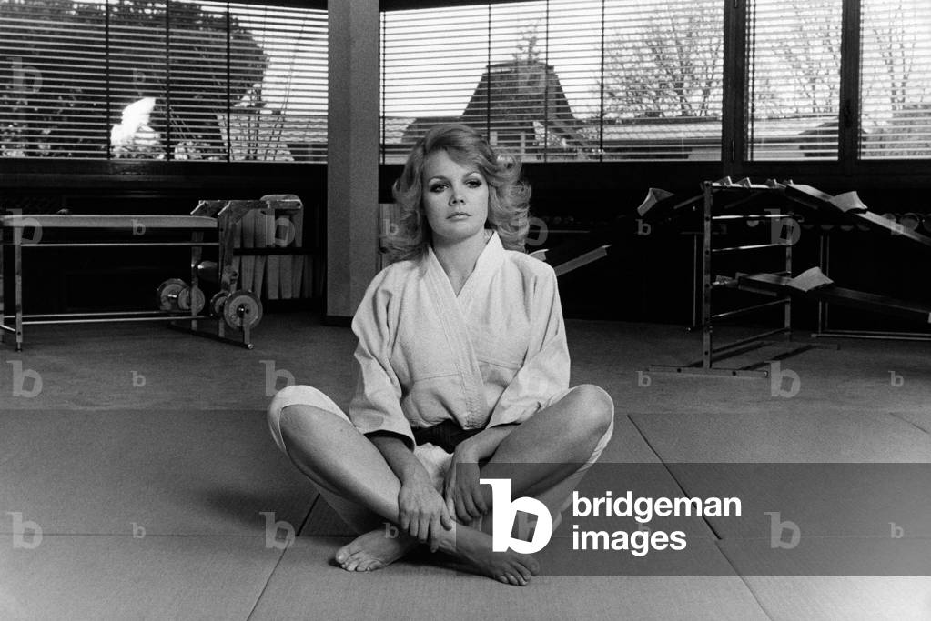 Carroll Baker wearing a judo uniform, 1970 (b/w photo)