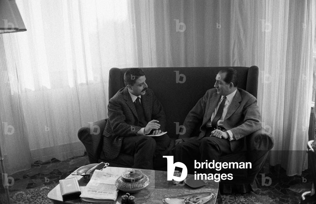 Gino Bartali talking to Giorgio Torelli