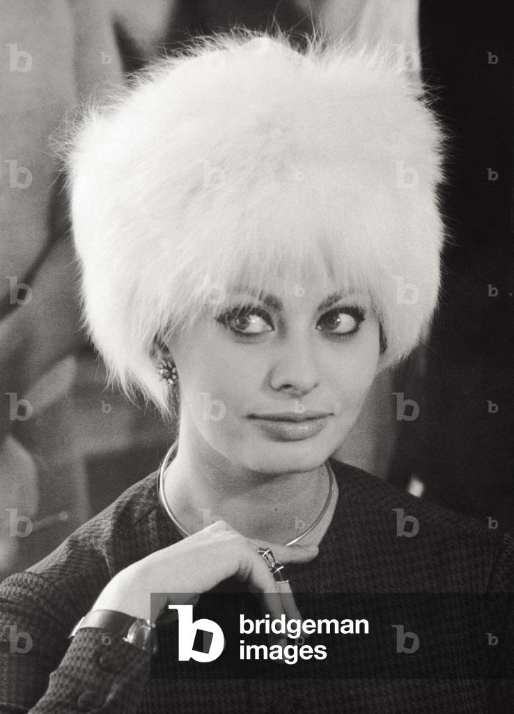 Close-up of Sophia Loren while is wearing a hat, 1963 (b/w photo)