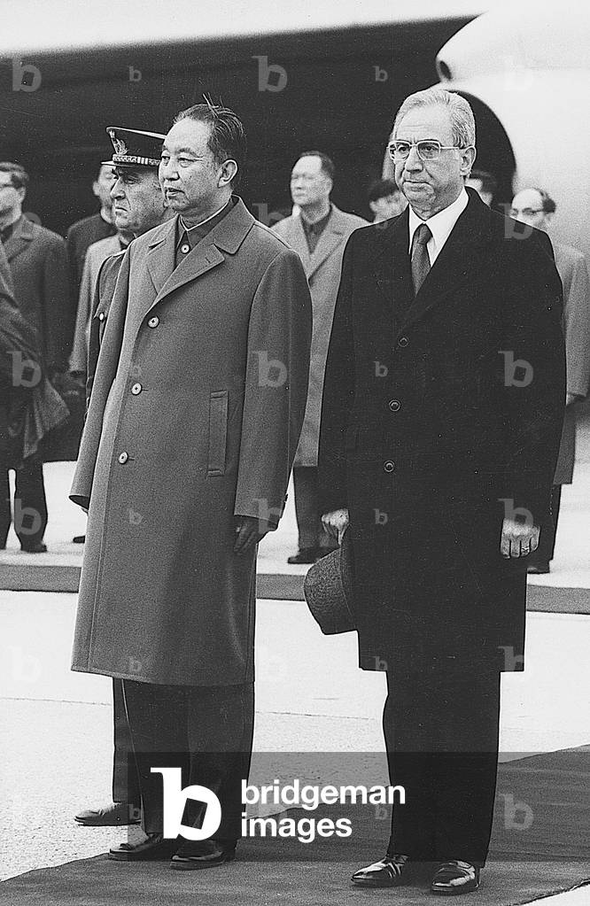 The President of the Council of Ministers of the Italian Republic Francesco Cossiga welcoming the President of the Communist Party of China Hua Guofeng at the airport, Rome, November 1979 (photo)