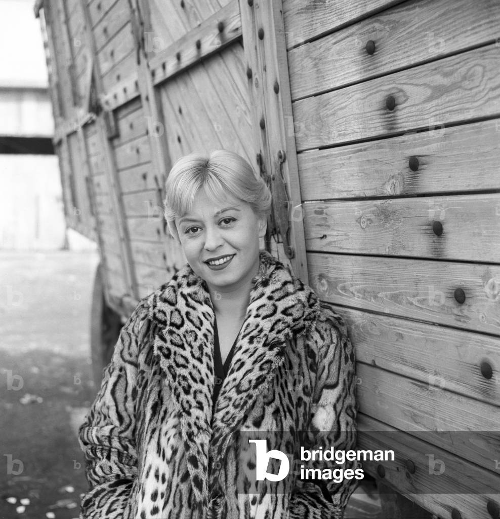 Giulietta Masina wearing a fur coat, Italy, 1960 (b/w photo)