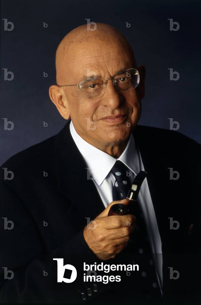 Sandro Curzi with a pipe in hand