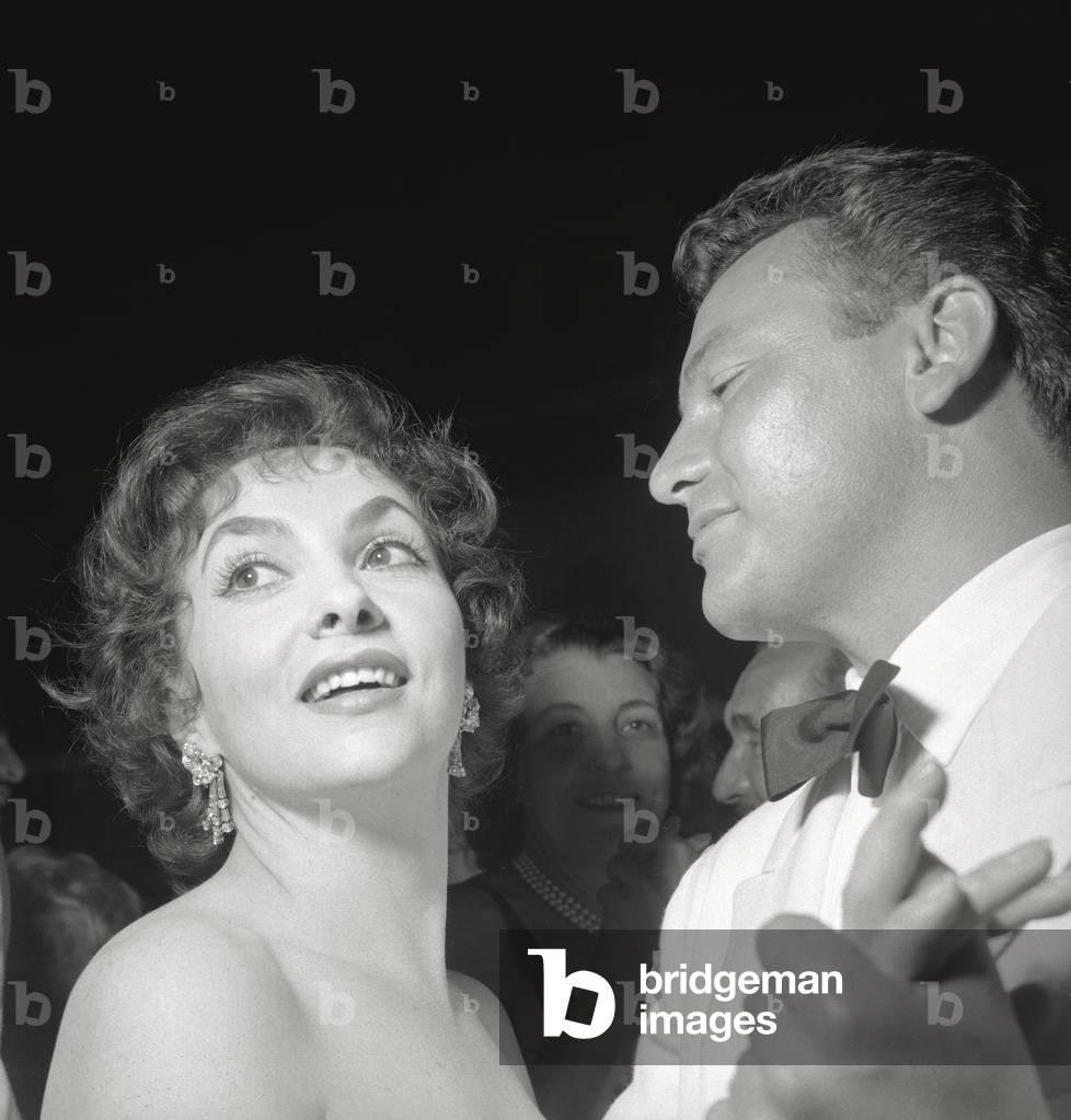 Gina Lollobrigida dances with a man, 1956 (b/w photo)