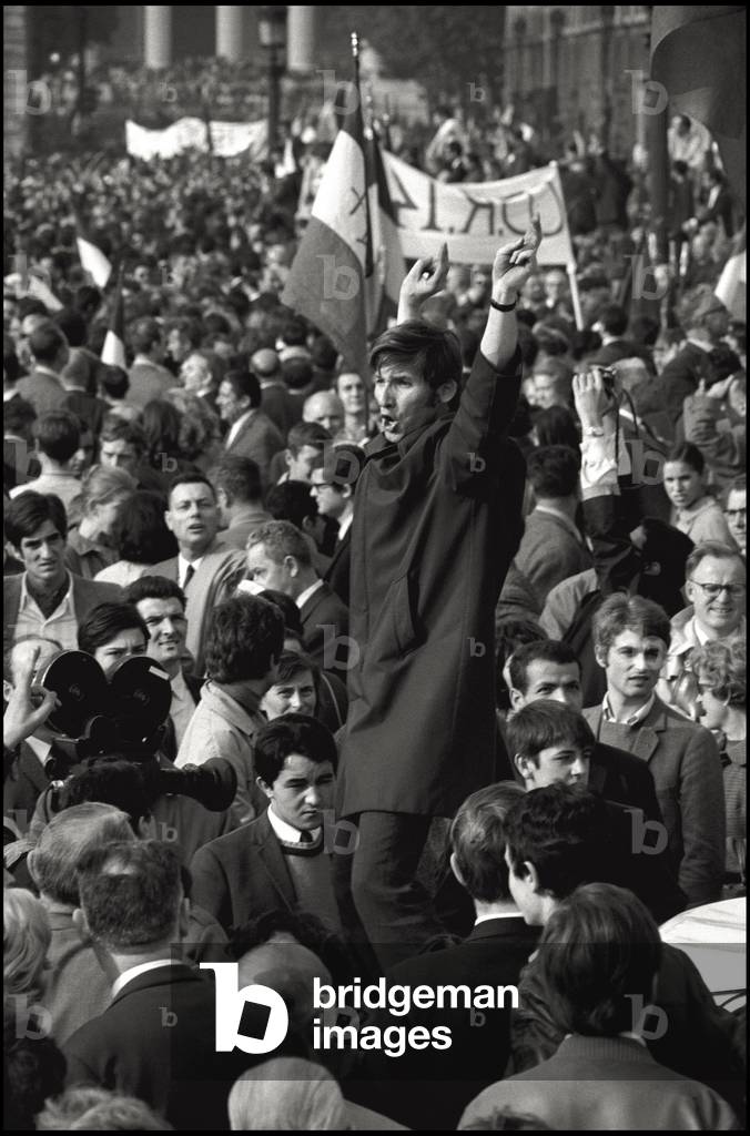 A man is haranguing a crowd in a demonstration of De Gaulle supporters in the Champs Elysees, after the decision of the President of the French Republic Charles de Gaulle to dissolve the National Assembly. The Gaullists aim the end of the disputes by claiming democracy to solve institutions crisis and the validity of the last trade unions statements. Paris (France), May 30, 1968 (b/w photo)