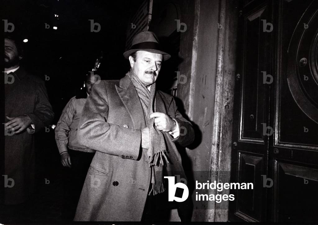 Roberto Calvi walking in the street, 1970 (b/w photo)