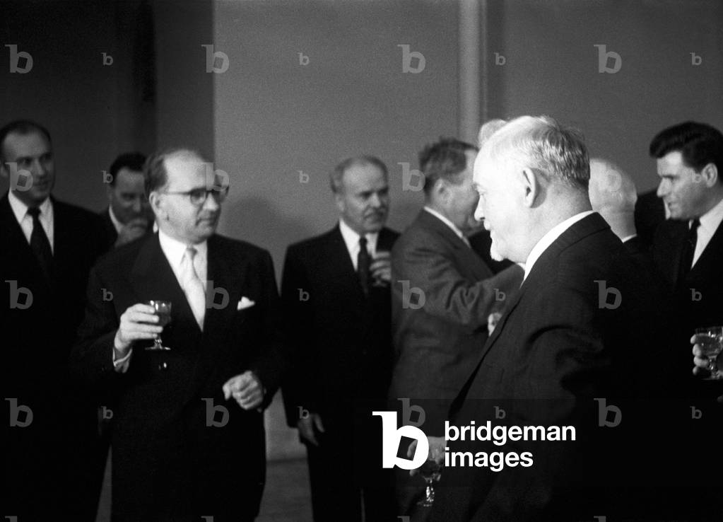Edgar Faure and Nikolai Bulganin drinking something at the Geneva Summit, Geneva, Switzerland
