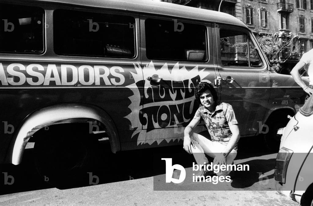 Little Tony next to his band's van
