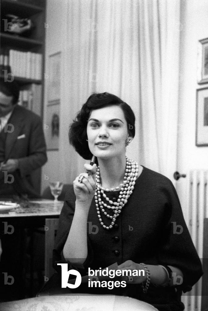 Jane Loncada seated in a living-room