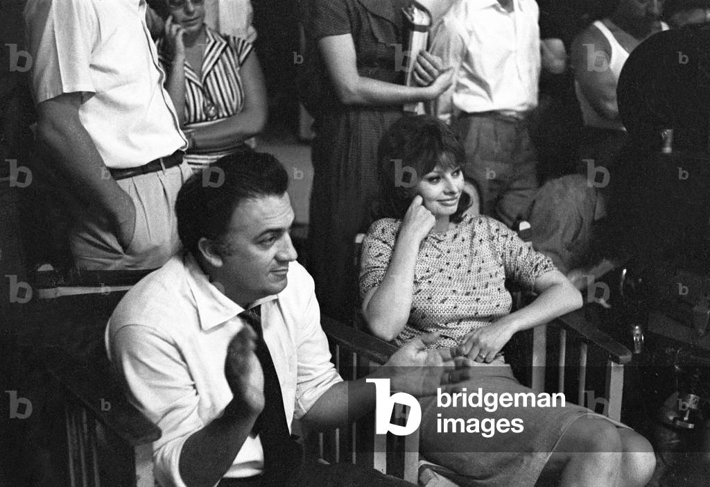 Federico Fellini and Sophia Loren on the set of It Started in Naples, Italy, 1959 (b/w photo)
