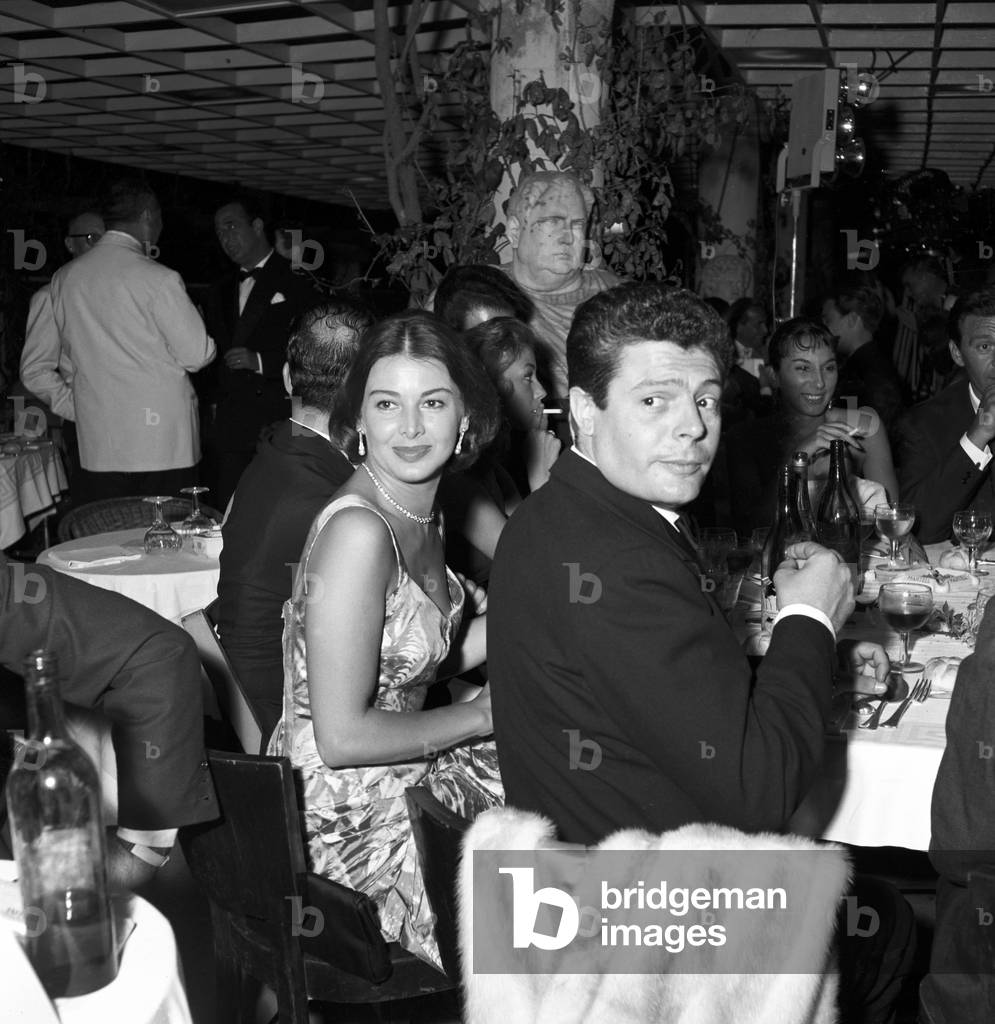 Marcello Mastroianni and Eleonora Rossi Drago sitting at the table, Italy, 1956 (b/w photo)