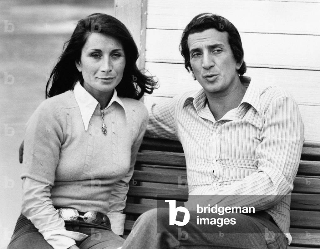 Luigi Vannucchi sitting on a bench with his wife Franca