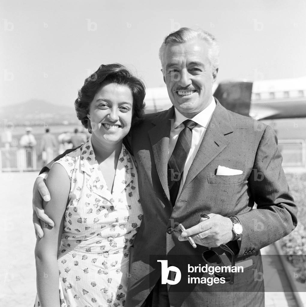 Vittorio De Sica smiling with his daughter Emi, Italy, 1958 (b/w photo)
