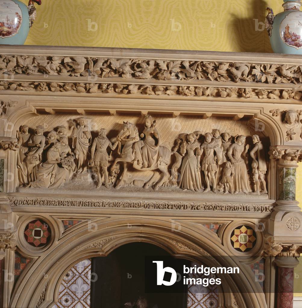 Carved fireplace in the drawing room, depicting Elizabeth I being greeted by the Earl of Hereford in 1591, 16th century (photo)