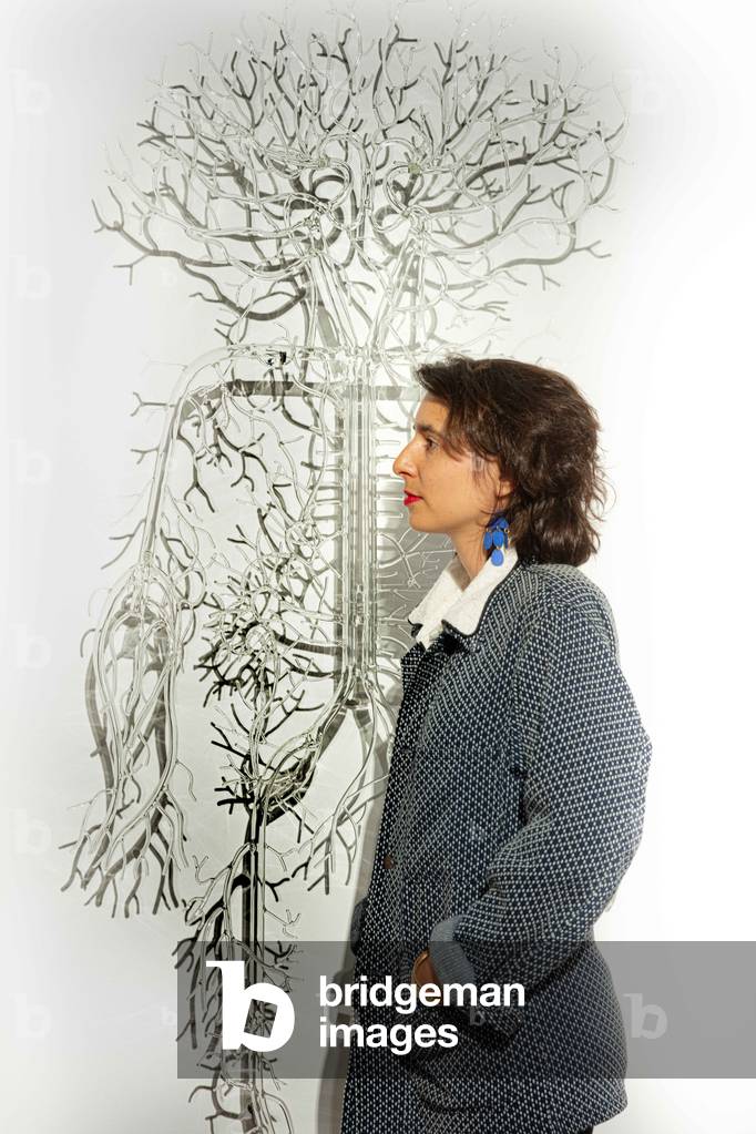 Prune Nourry poses in front of his work River Woman. 2019 (photograph)