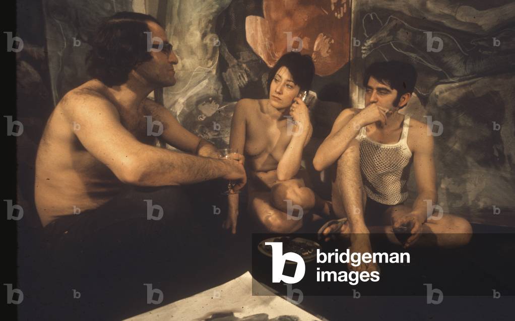 Moira and Vittorio discussing bodypainting technique with artist Ulrico Montefiore, Montefiore Studio, London, UK, 1968 (photo)