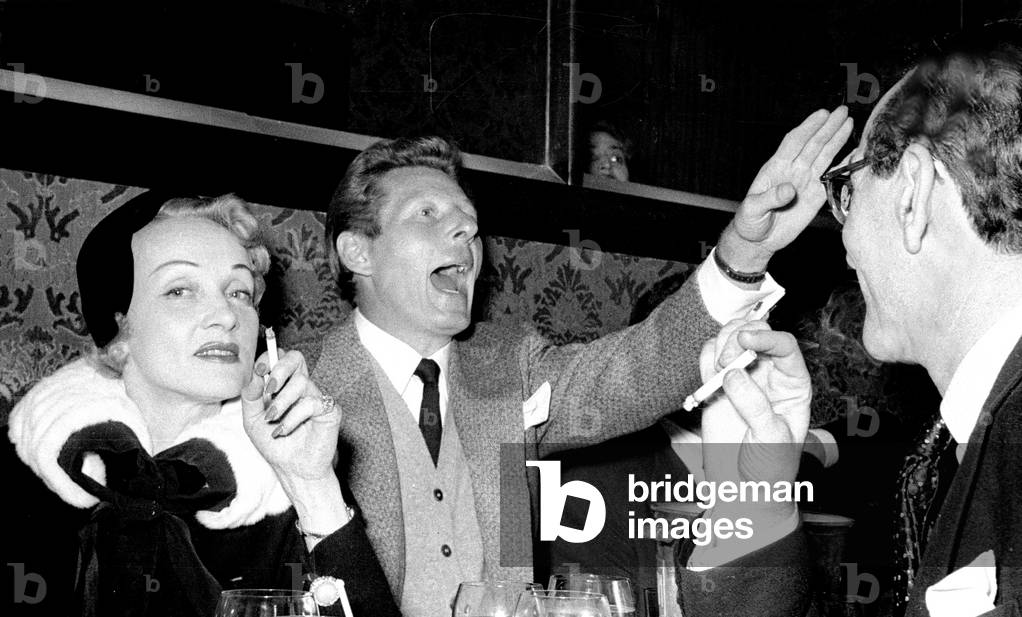 Marlene Dietrich with Danny Kaye and an unidentified friend, Stork Room, London, UK, 1956 (b/w photo)