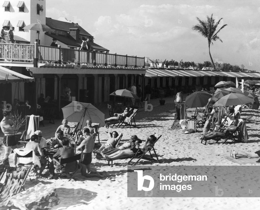 Sunbathers enjoy a day on Miami Beach, c.1935 (b/w photo)