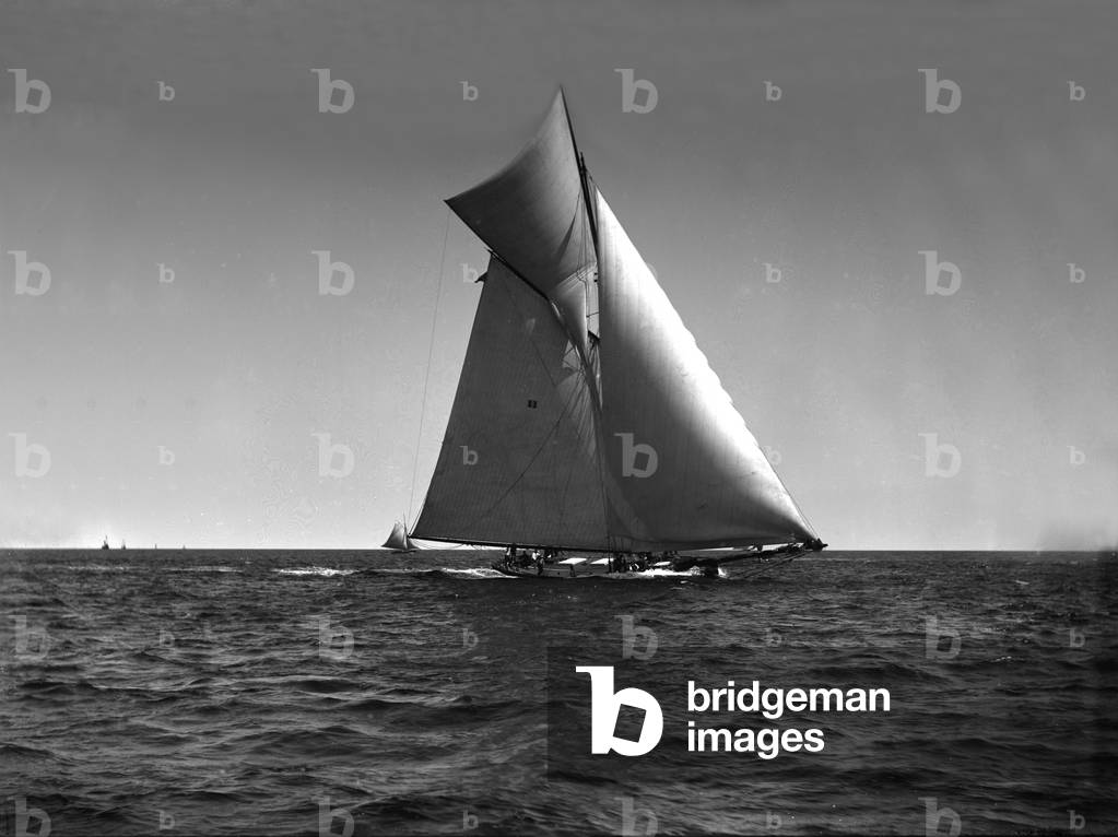 A sailboat glides across the water, c.1890 (b/w photo)