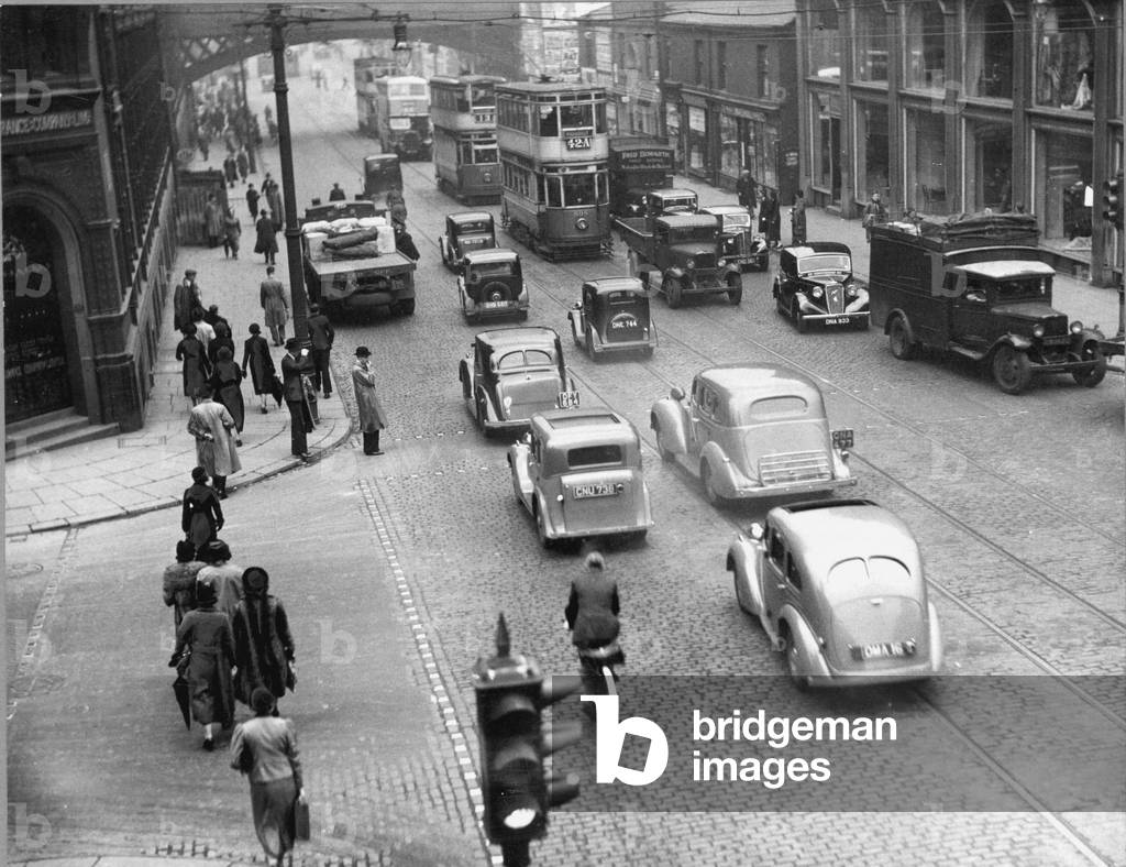 Trams on Oxford Road, Manchester, 1937 (b/w photo)