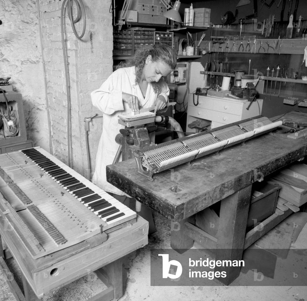 Piano restorer (b/w photo)