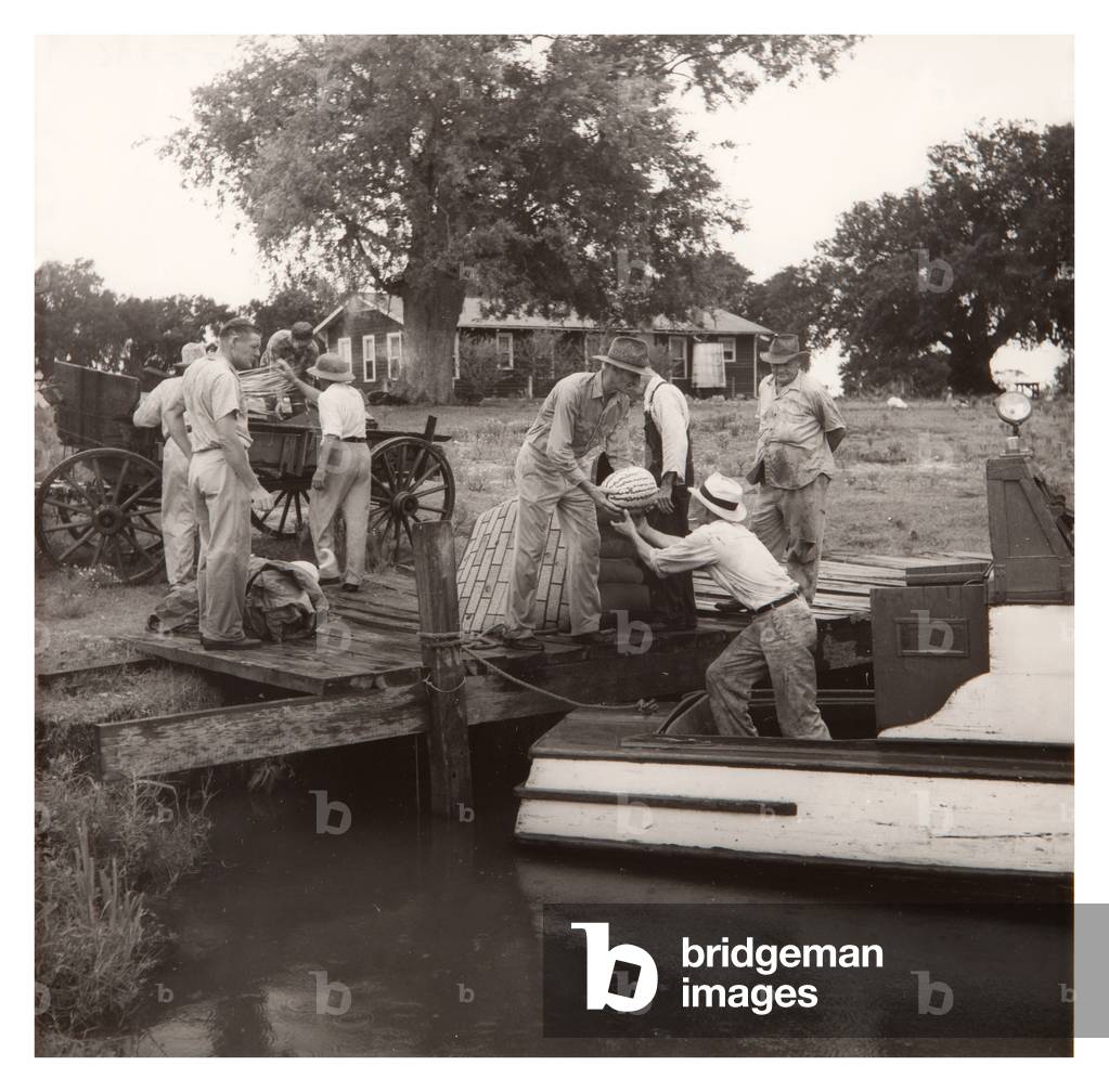 Louisiana, The Mailman Gets a Present of a Melon, 1947 (photo)