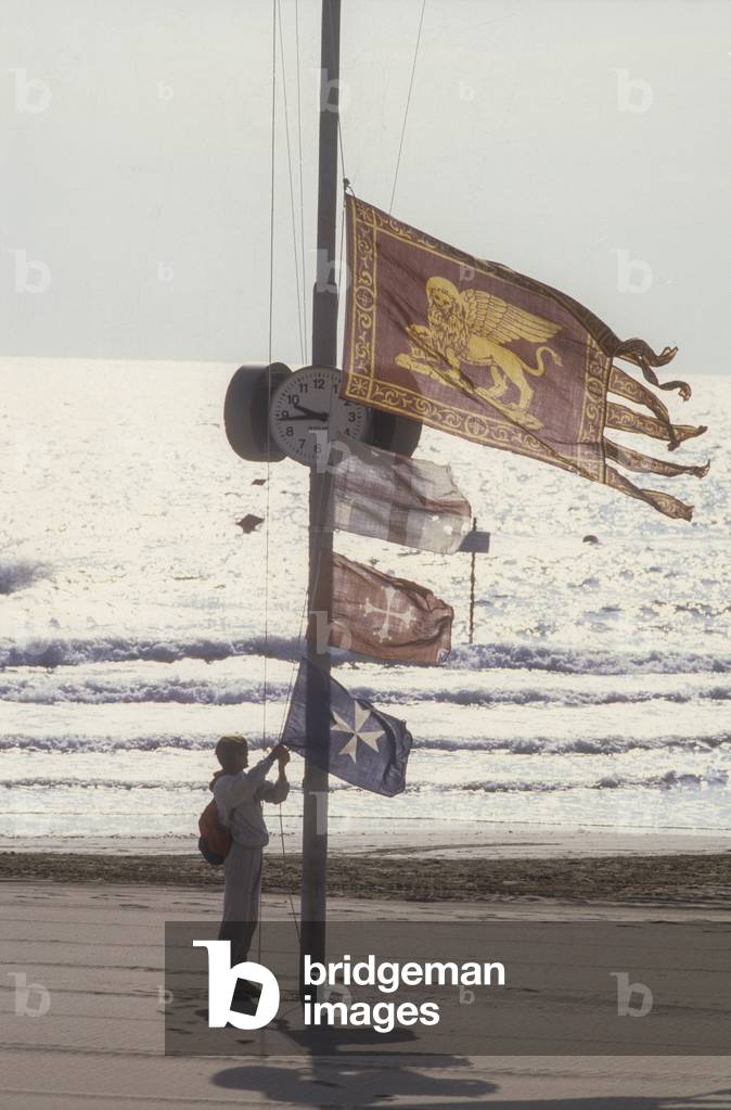Venice Lido, Venice Film Festival 1985. Flags on the seashore