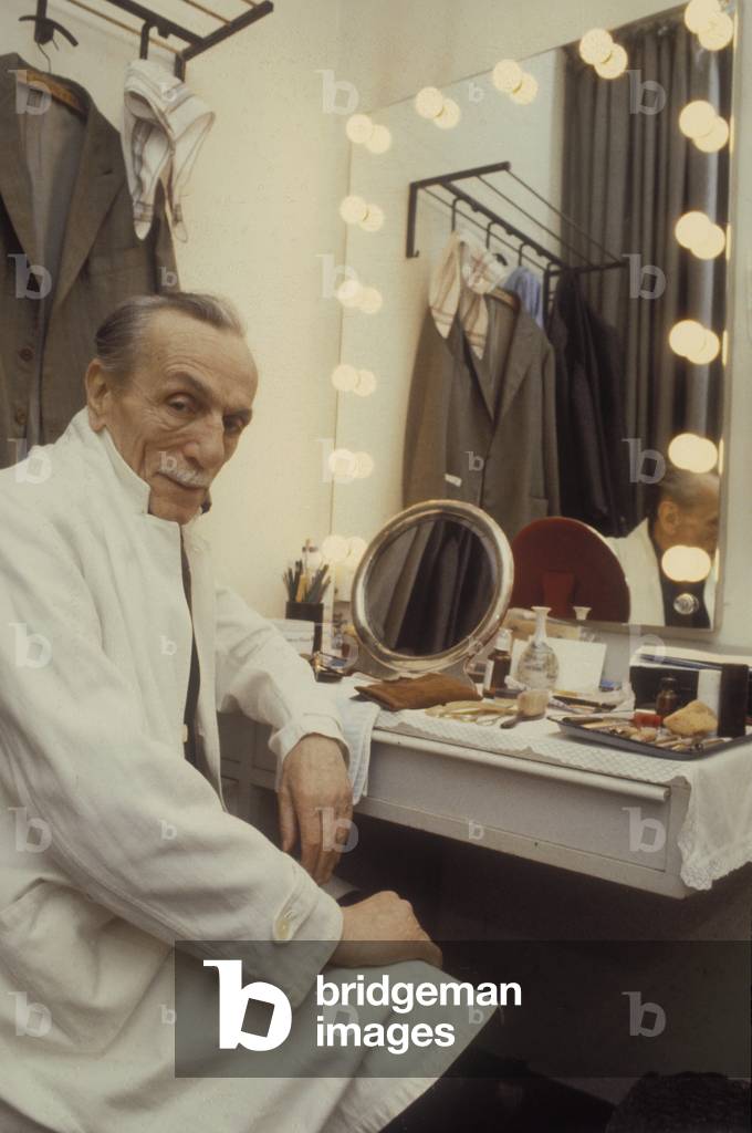 Milan, Teatro Manzoni, about 1980. Italian playwright and actor Eduardo De Filippo in his dressing room before a show (photo)