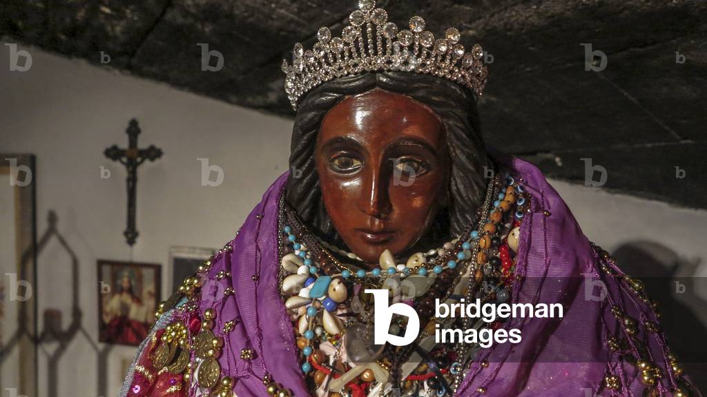 Statue of St. Sarah in the crypt of the Church of the Saintes Maries de la Mer in the Provence region, France. St. Sara is a major figure of the Gypsy cultural tradition