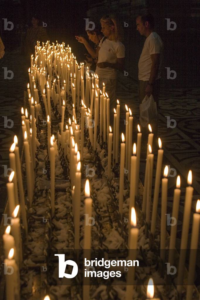 Votive candles in the Milan Cathedral